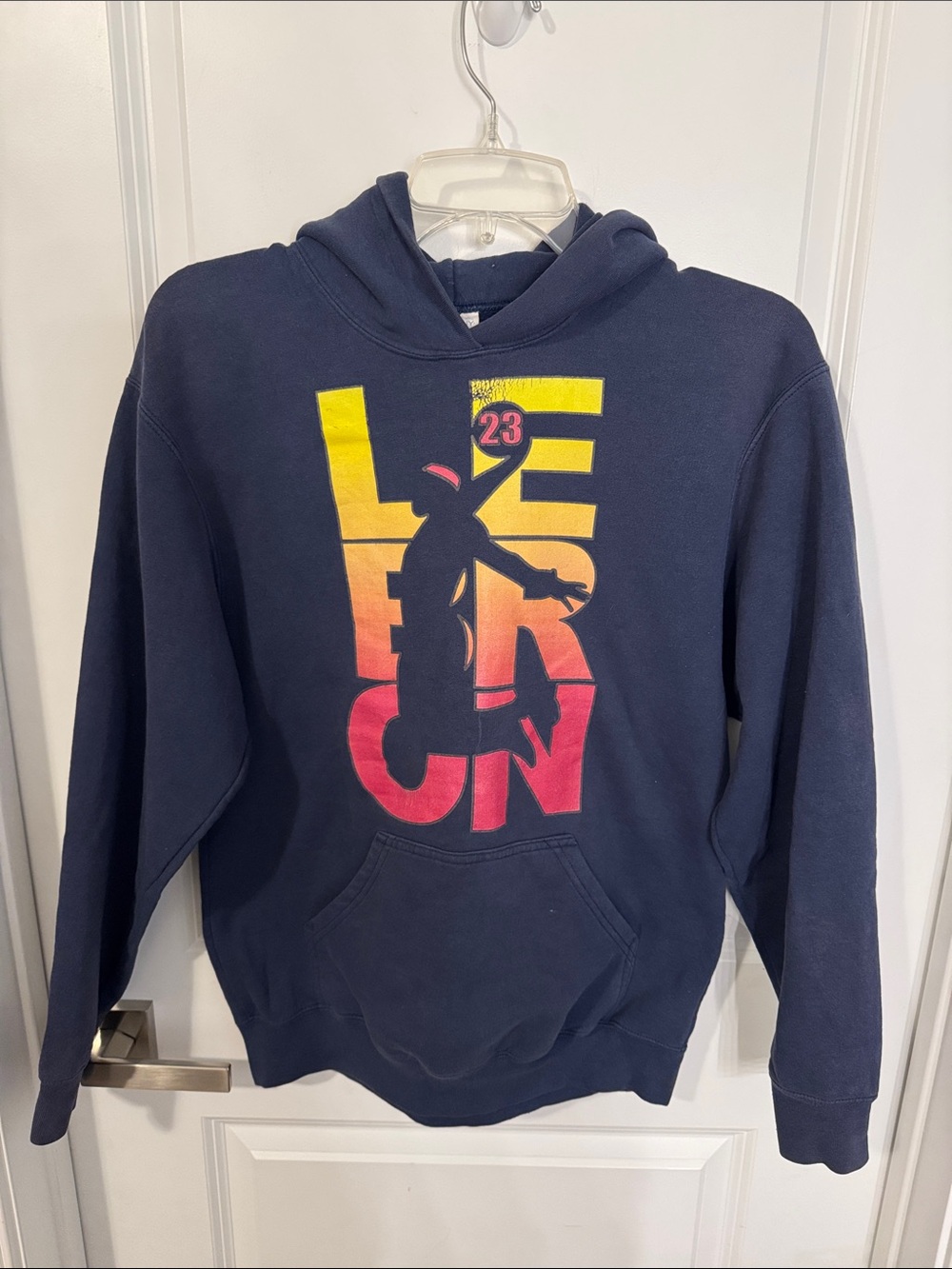 Port and Company Navy Hoodie with Yellow-to-Red Gradient Jumpman Graphic
